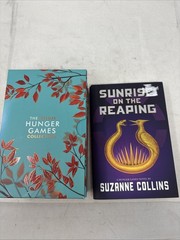 The Deluxe Hunger Games collection paperback + hard cover sunrise on the reaping
